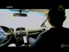 Ronaldinho, el astro brasileiro en un documental de canal+. Podemos apreciar un dock con un iPod nano en su coche.